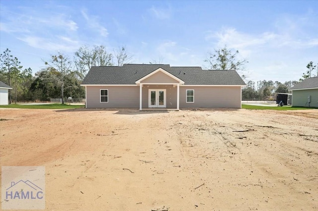 back of house featuring french doors