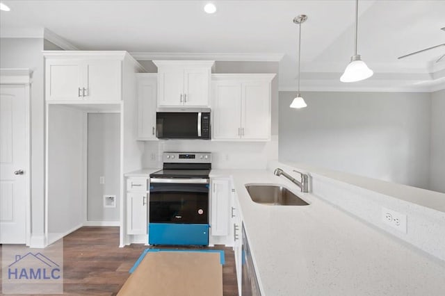 kitchen featuring a sink, white cabinets, and stainless steel appliances