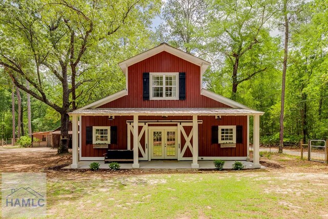 410 Green Morgan School Rd, Clyo, GA 31303 - view of front of house featuring a porch, french doors, and metal roof