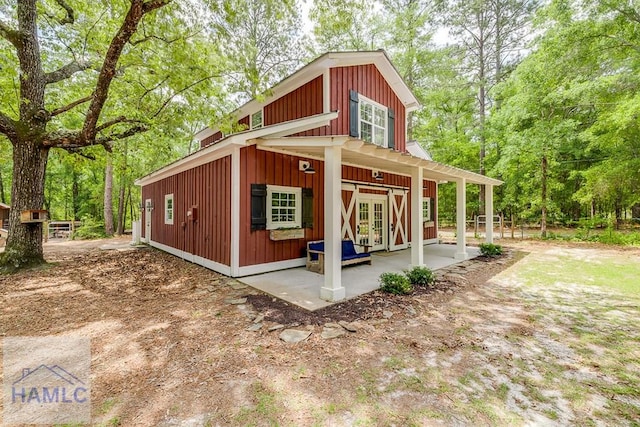 410 Green Morgan School Rd, Clyo, GA 31303 - view of front facade featuring board and batten siding and french doors