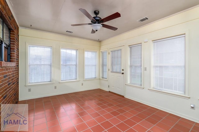 401E Smith St, Claxton, GA 30417 - unfurnished sunroom featuring tile patterned flooring and ornamental molding