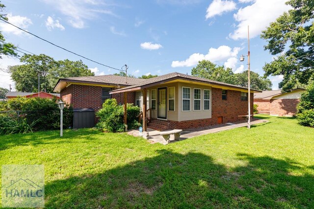 401E Smith St, Claxton, GA 30417 - rear view of property with brick siding