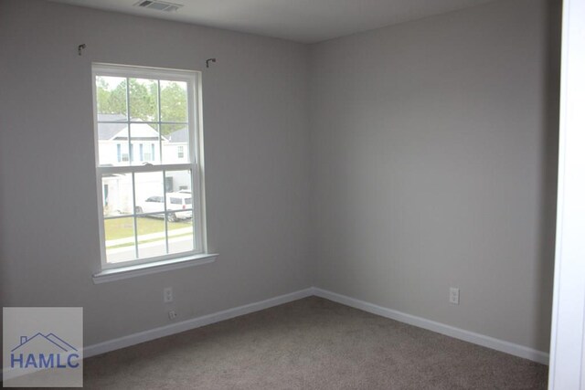 empty room with carpet floors