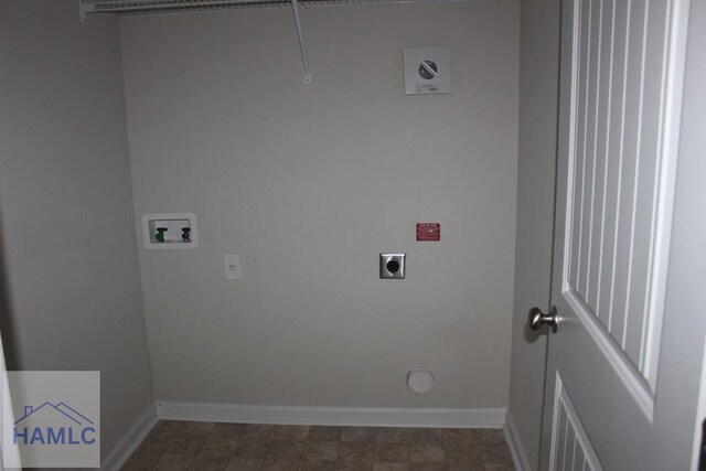 clothes washing area with washer hookup and hookup for an electric dryer