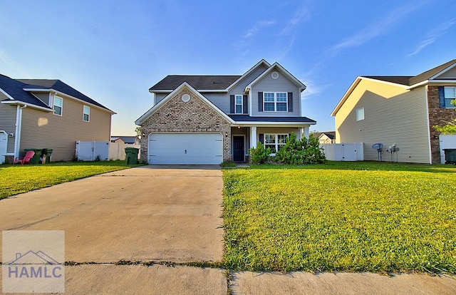 view of front of property with a garage and a front yard