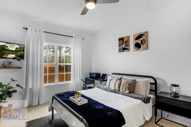 bedroom featuring carpet floors, ceiling fan, and baseboards