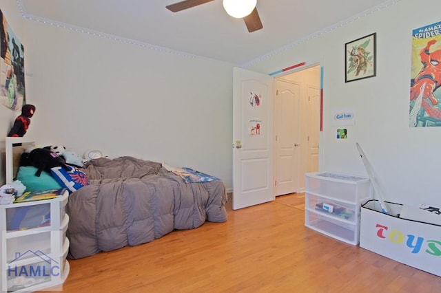 435 Arlington Dr, Hinesville, GA 31313 - bedroom featuring light wood finished floors, ceiling fan, and ornamental molding