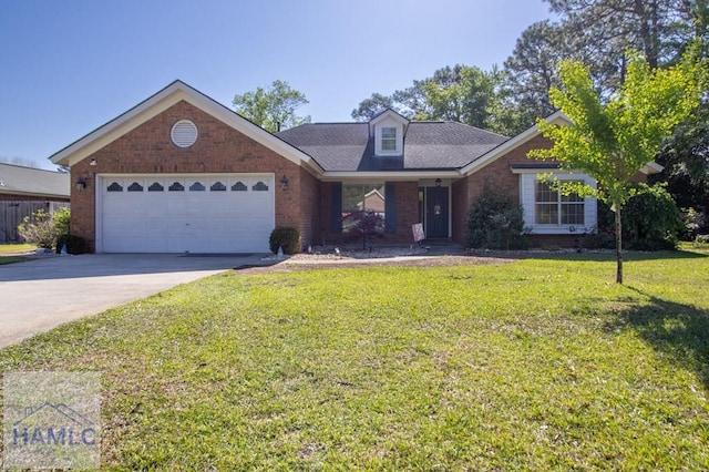 435 Arlington Dr, Hinesville, GA 31313 - view of front of home featuring a garage, driveway, a front lawn, and brick siding