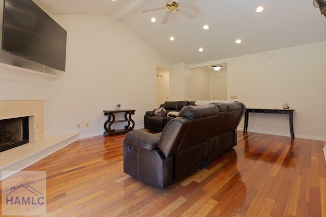 435 Arlington Dr, Hinesville, GA 31313 - living area featuring recessed lighting, a ceiling fan, beamed ceiling, wood finished floors, and a premium fireplace
