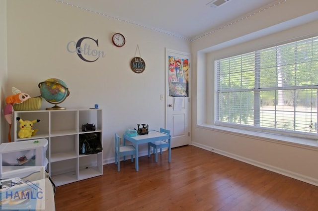 435 Arlington Dr, Hinesville, GA 31313 - game room featuring visible vents, baseboards, and wood finished floors
