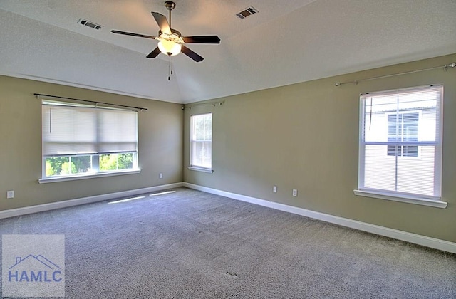 587 Fairview Cir, Hinesville, GA 31313 - carpeted spare room featuring ceiling fan, baseboards, and vaulted ceiling