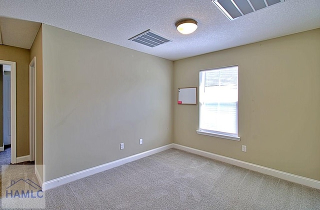 587 Fairview Cir, Hinesville, GA 31313 - carpeted spare room featuring baseboards and a textured ceiling