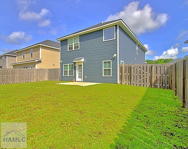 587 Fairview Cir, Hinesville, GA 31313 - rear view of property with a patio