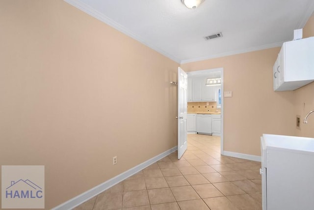 corridor with visible vents, crown molding, baseboards, and light tile patterned flooring