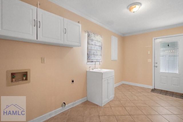 laundry room featuring hookup for a washing machine, cabinet space, light tile patterned flooring, a sink, and electric dryer hookup