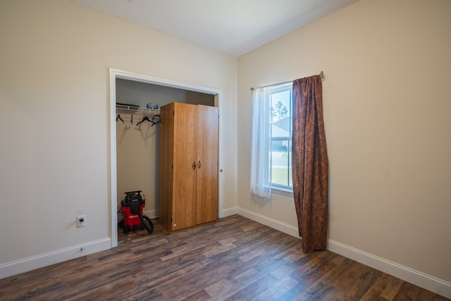 361 Thorp Cir, Hinesville, GA 31313 - unfurnished bedroom with dark hardwood / wood-style flooring and a closet