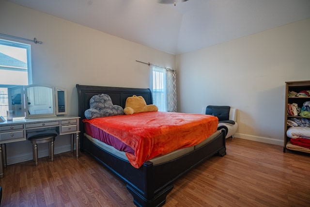 361 Thorp Cir, Hinesville, GA 31313 - bedroom featuring lofted ceiling and dark wood-type flooring