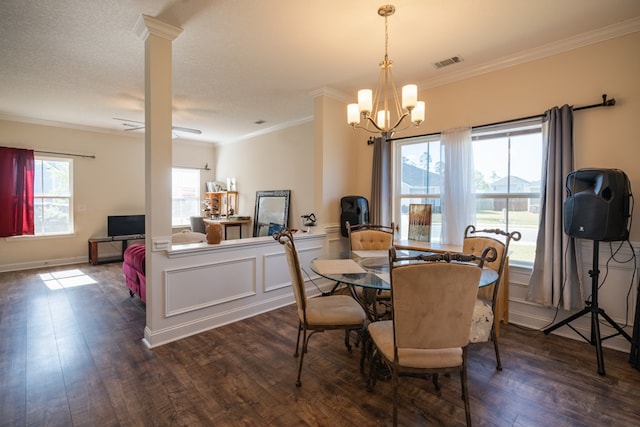 361 Thorp Cir, Hinesville, GA 31313 - dining area featuring dark wood-type flooring, ornamental molding, a chandelier, and ornate columns