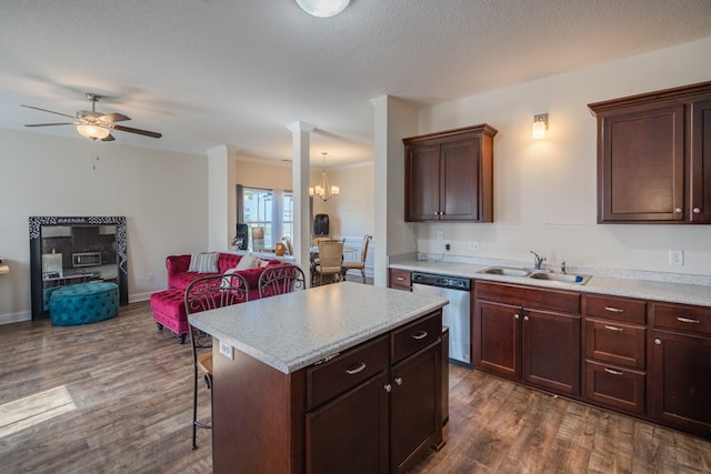 361 Thorp Cir, Hinesville, GA 31313 - kitchen featuring sink, dark wood-type flooring, a breakfast bar, a center island, and stainless steel dishwasher