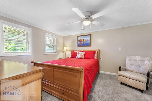 carpeted bedroom with ceiling fan, a textured ceiling, and ornamental molding