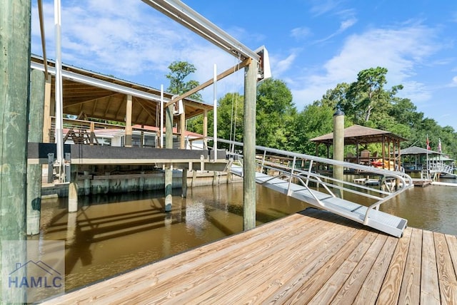 dock area featuring a water view