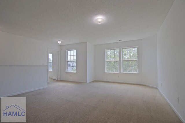 1 Blackberry Ln, Port Wentworth, GA 31407 - spare room featuring light colored carpet and baseboards