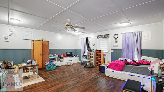 705 S 11th St, Jesup, GA 31545 - bedroom featuring wainscoting, wood finished floors, ornamental molding, and ceiling fan