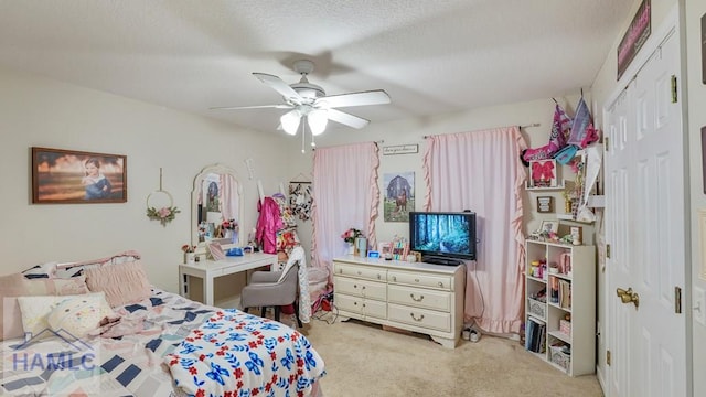 705 S 11th St, Jesup, GA 31545 - bedroom with light colored carpet, a closet, and ceiling fan
