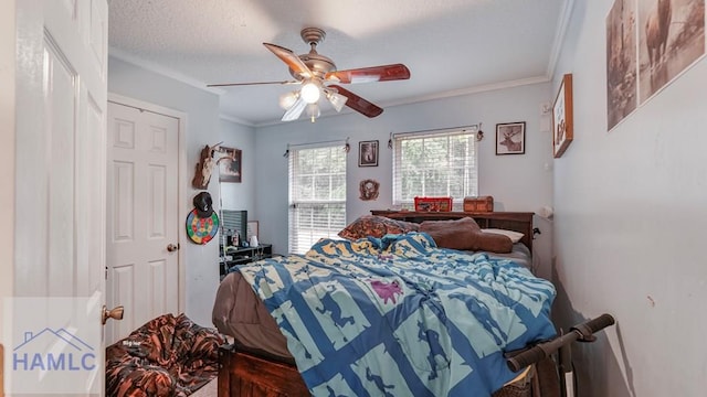 705 S 11th St, Jesup, GA 31545 - bedroom featuring ornamental molding and a ceiling fan