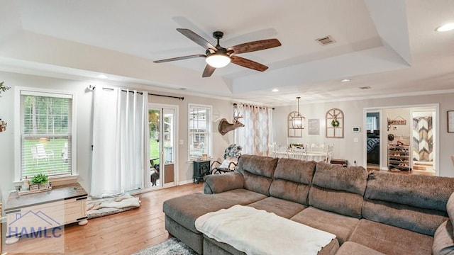 705 S 11th St, Jesup, GA 31545 - living room with a tray ceiling, hardwood / wood-style floors, ceiling fan, and recessed lighting