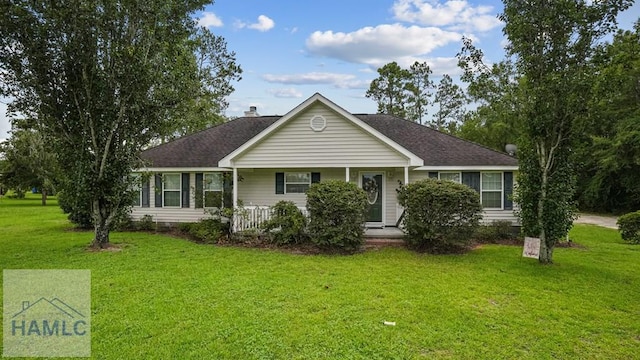 705 S 11th St, Jesup, GA 31545 - ranch-style home with a front yard, covered porch, roof with shingles, and a chimney