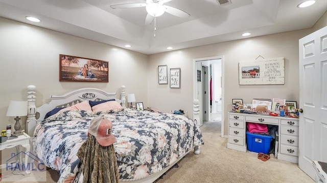 705 S 11th St, Jesup, GA 31545 - bedroom featuring light carpet, recessed lighting, a ceiling fan, and a raised ceiling