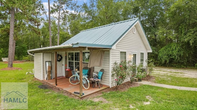 705 S 11th St, Jesup, GA 31545 - view of outbuilding featuring view of scattered trees