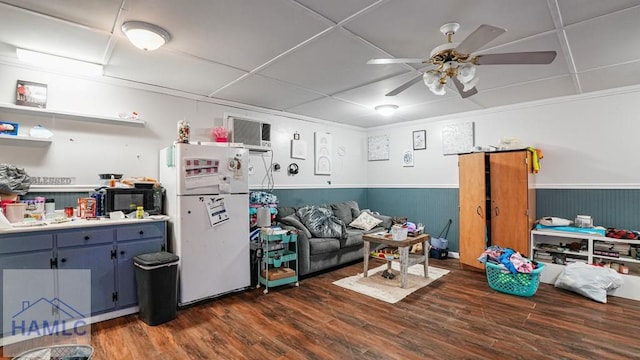705 S 11th St, Jesup, GA 31545 - living area featuring ceiling fan, wainscoting, and wood finished floors