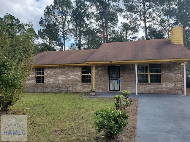 ranch-style home with a front yard