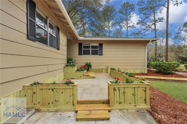 105N Bay St, Jesup, GA 31545 - view of side of property featuring a patio