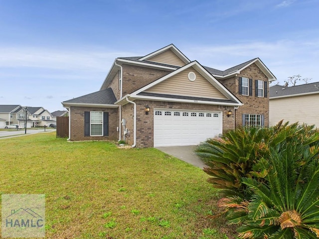 traditional-style home featuring a garage, driveway, brick siding, and a front lawn