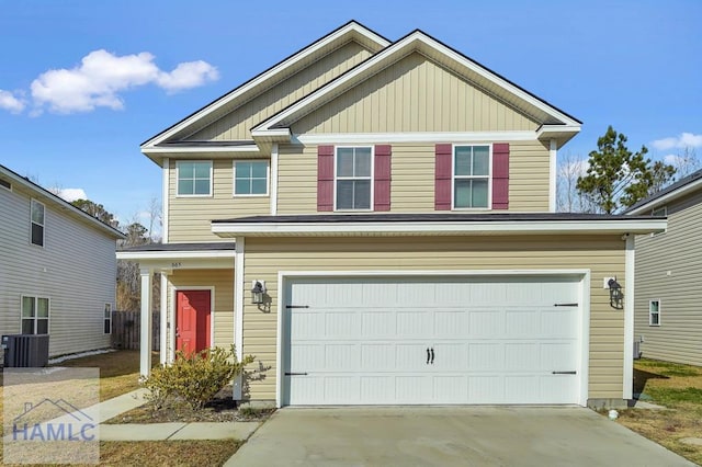 craftsman house featuring a garage and central AC