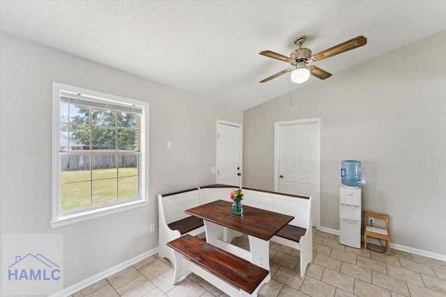 1105 Apache Aly, Hinesville, GA 31313 - dining space with lofted ceiling, a ceiling fan, and light tile patterned flooring