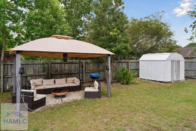 1105 Apache Aly, Hinesville, GA 31313 - fenced backyard featuring a gazebo, an outdoor hangout area, and a storage unit