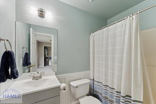 1105 Apache Aly, Hinesville, GA 31313 - full bath featuring vanity, a shower with shower curtain, and a wainscoted wall