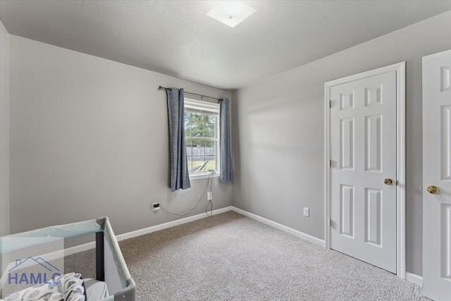 1105 Apache Aly, Hinesville, GA 31313 - unfurnished bedroom featuring carpet floors and baseboards