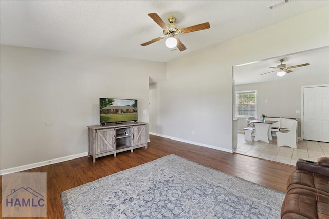 1105 Apache Aly, Hinesville, GA 31313 - living room with ceiling fan and wood finished floors