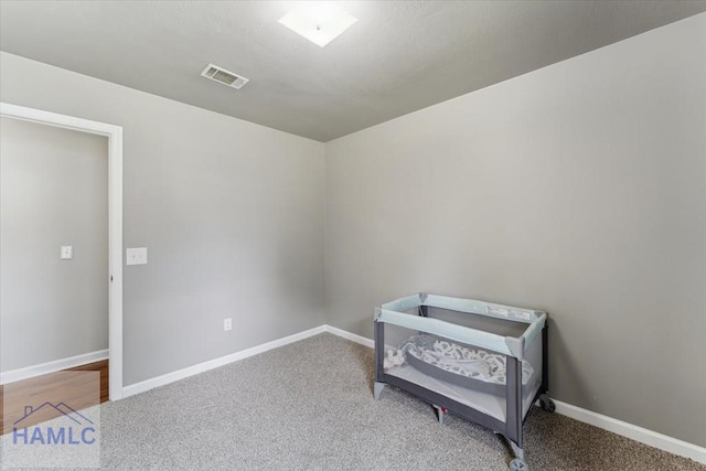 1105 Apache Aly, Hinesville, GA 31313 - carpeted bedroom with baseboards