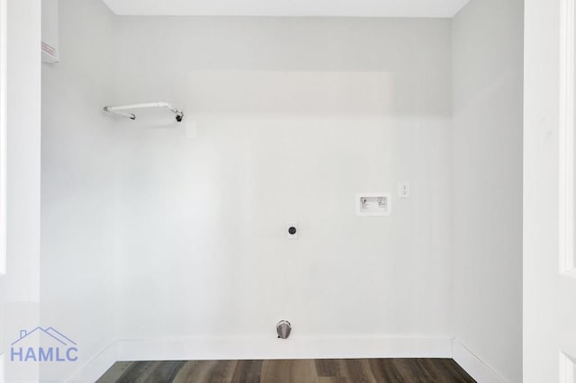 30 Cypress Cv NE, Ludowici, GA 31316 - washroom with washer hookup and dark wood-style flooring