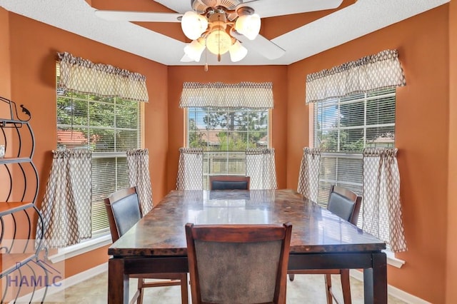 dining room with ceiling fan