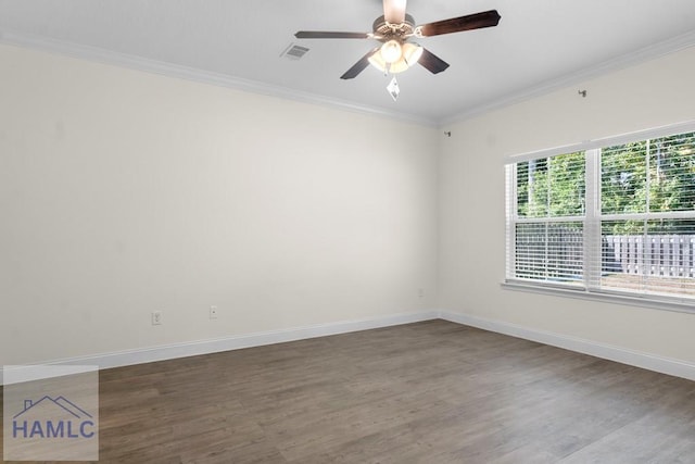 unfurnished room featuring ceiling fan, wood-type flooring, and ornamental molding