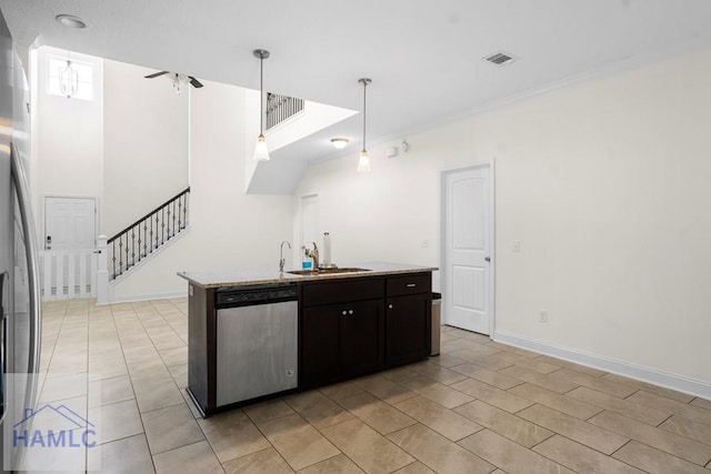 kitchen featuring dark brown cabinetry, stainless steel appliances, ceiling fan, sink, and hanging light fixtures