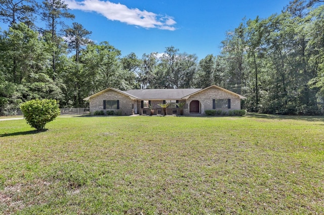 single story home with a front yard