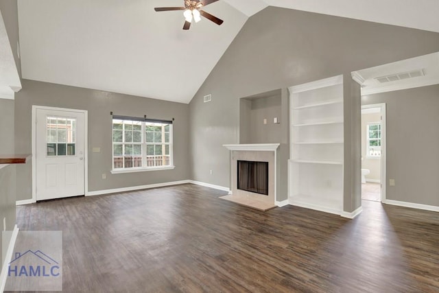 29 Joy Ln, Midway, GA 31320 - unfurnished living room with ceiling fan, high vaulted ceiling, a fireplace, healthy amount of natural light, and dark wood finished floors